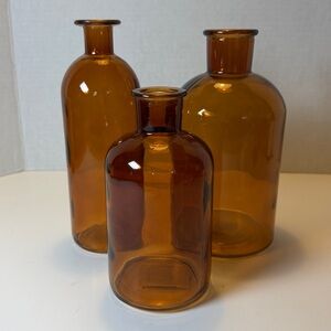 Set of Three of Medium Amber Glass Bottles
